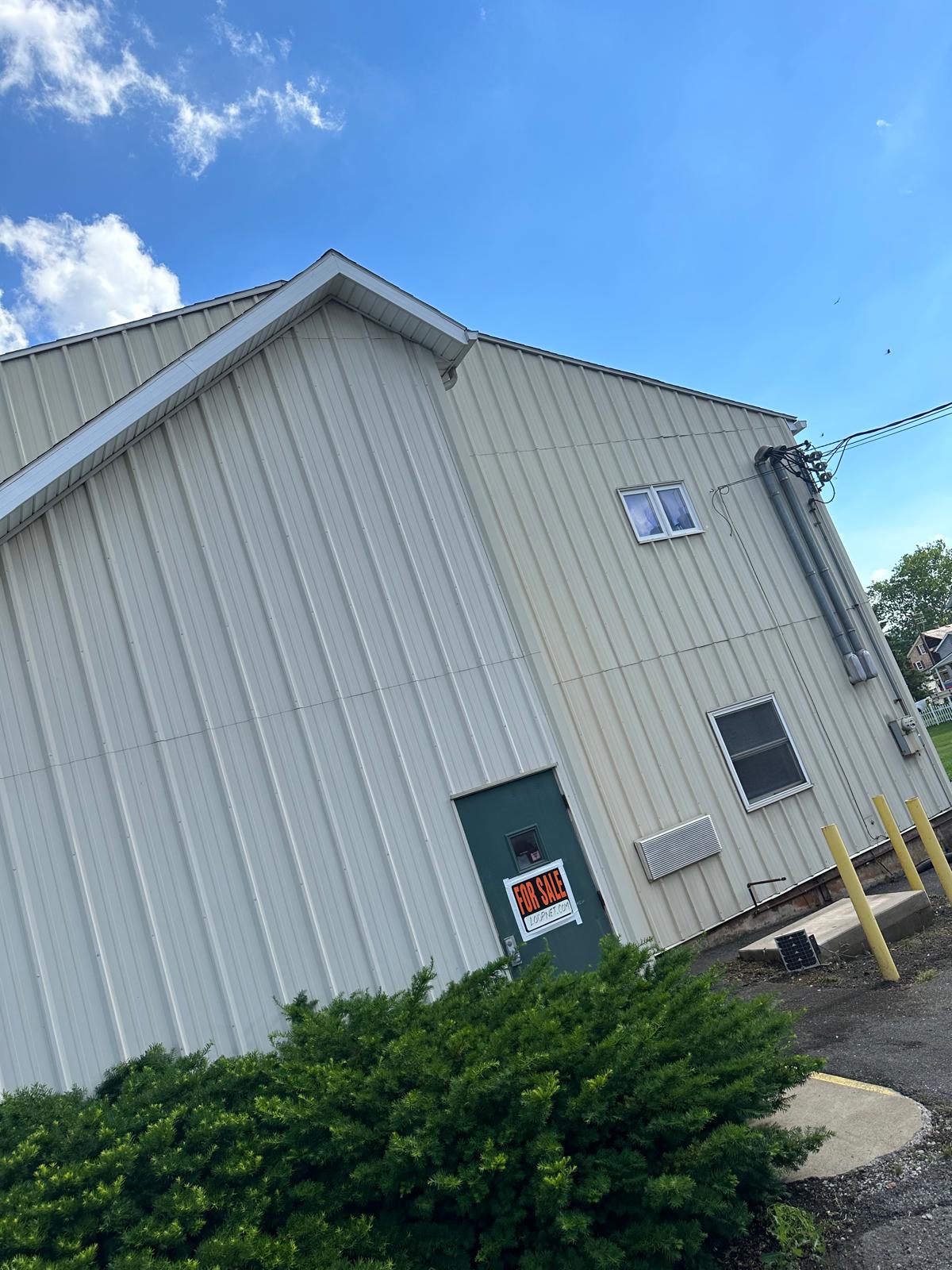 Commercial Pressure Washing & Metal Siding Cleaning for Shops | Turbo Cleaning